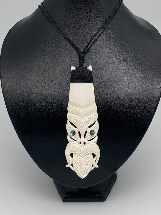 TB-taniwha_maori-bone-carving-necklace-1_1024x - Living + Nomads – Travel  tips, Guides, News & Information!
